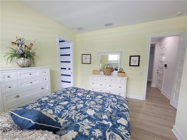 bedroom featuring light wood-type flooring