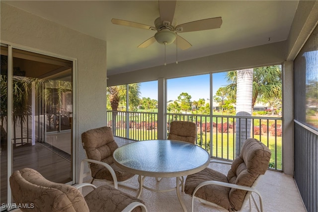 sunroom / solarium with ceiling fan