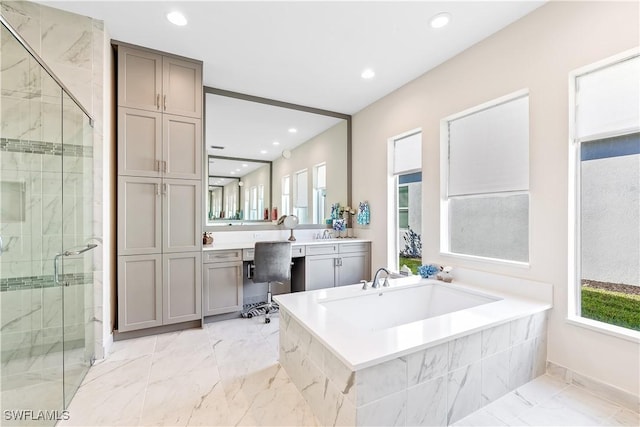 12047 Oleander Ave, Naples, FL 34120 - full bath with a bath, a stall shower, vanity, recessed lighting, and marble finish floors