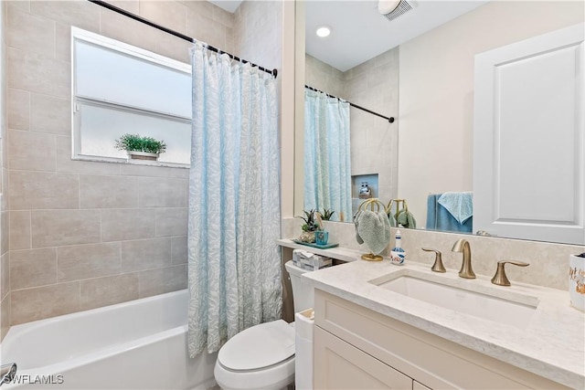 12047 Oleander Ave, Naples, FL 34120 - bathroom featuring vanity and shower / tub combo