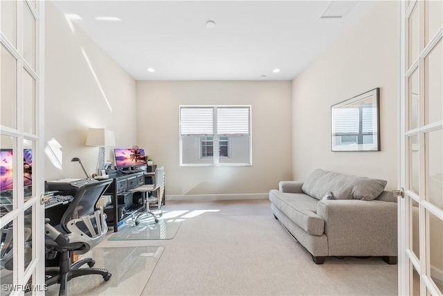 office featuring light carpet and french doors