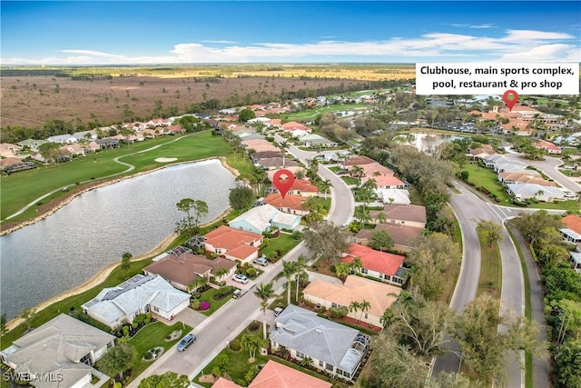 bird's eye view featuring a residential view and a water view