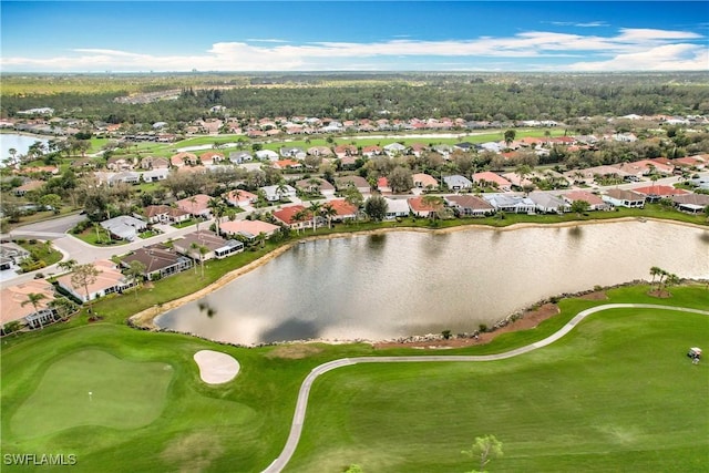 aerial view with a water view, a residential view, and golf course view