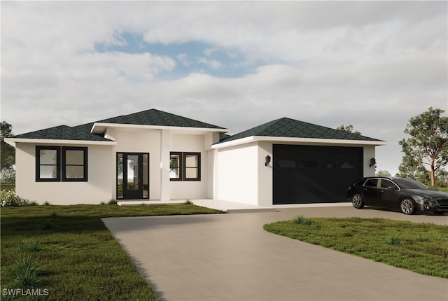 view of front of home featuring a front lawn and a garage