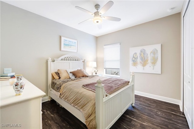 bedroom featuring dark hardwood / wood-style flooring and ceiling fan