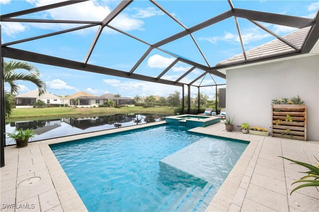 view of swimming pool with a lanai, a patio area, a water view, and an in ground hot tub