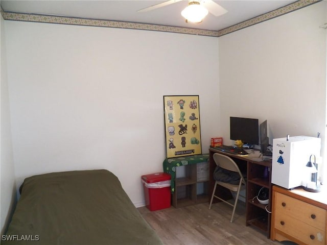 office space featuring ceiling fan and hardwood / wood-style floors