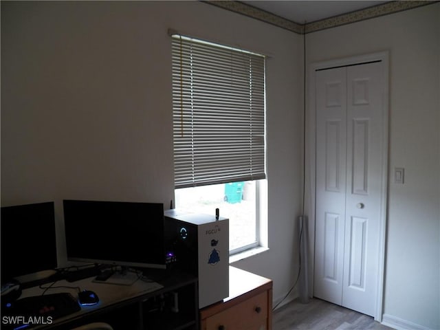 home office with light wood-type flooring