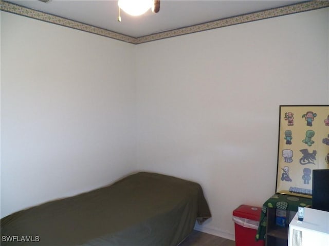 unfurnished bedroom featuring hardwood / wood-style floors