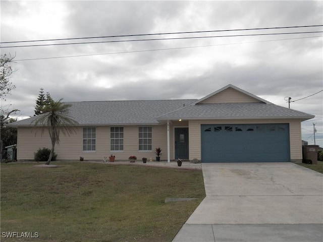 ranch-style home with a front yard and a garage