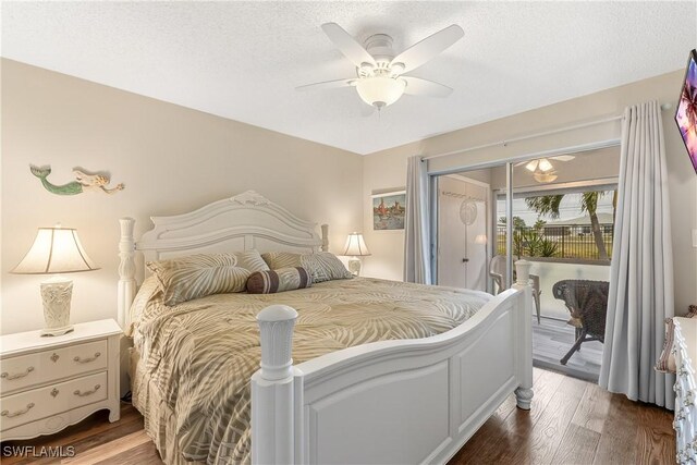 bedroom with ceiling fan, a textured ceiling, dark hardwood / wood-style flooring, and access to outside