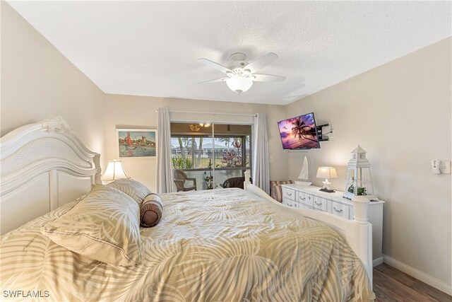 bedroom featuring ceiling fan, access to exterior, a textured ceiling, and hardwood / wood-style flooring