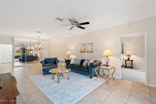 living room with ceiling fan with notable chandelier, crown molding, and light tile patterned flooring