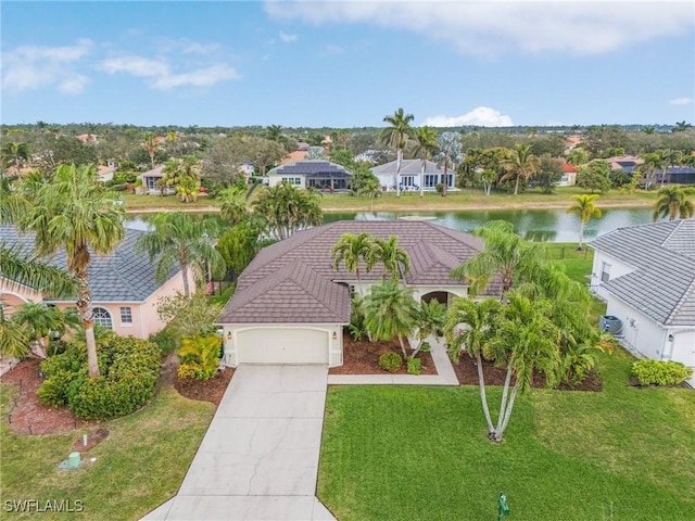 drone / aerial view with a water view