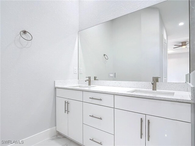 bathroom with vanity and ceiling fan