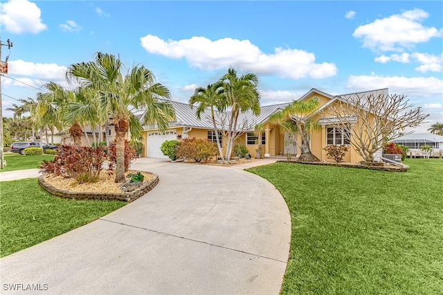 ranch-style home with a front yard and a garage