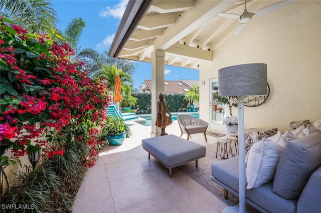 view of patio / terrace with an outdoor hangout area and ceiling fan