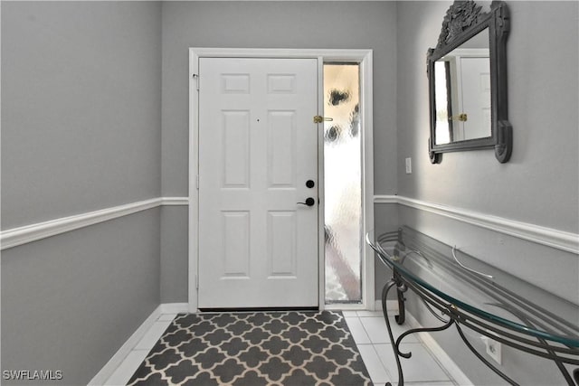 foyer featuring light tile patterned flooring