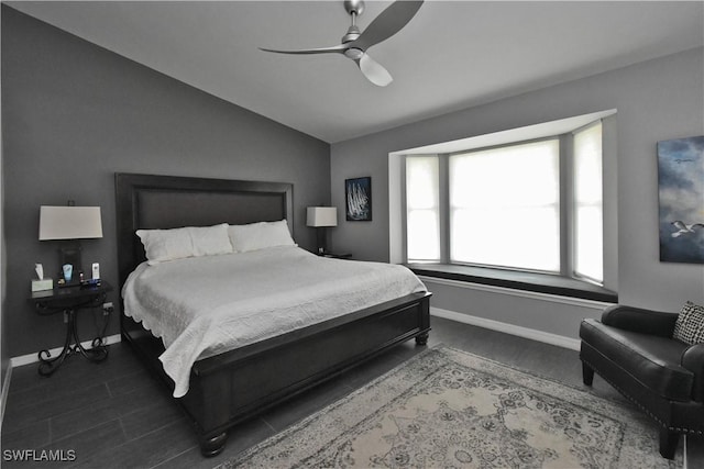 bedroom with ceiling fan and vaulted ceiling