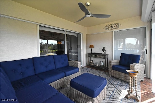 view of patio with ceiling fan and an outdoor hangout area