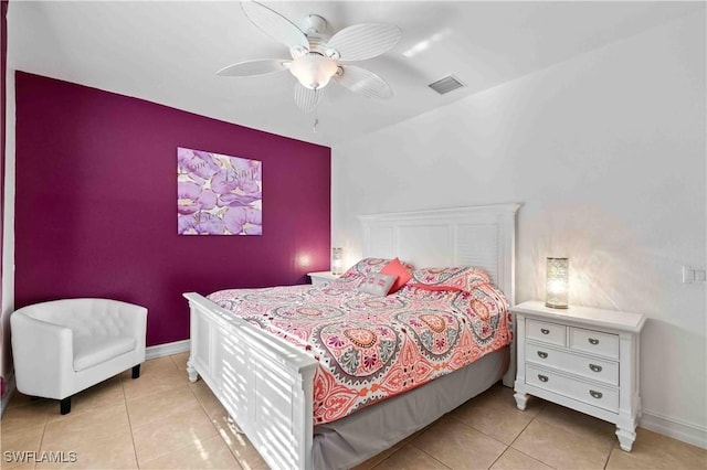 106 SE 5th St, Cape Coral, FL 33990 - bedroom featuring light tile patterned flooring, baseboards, and a ceiling fan