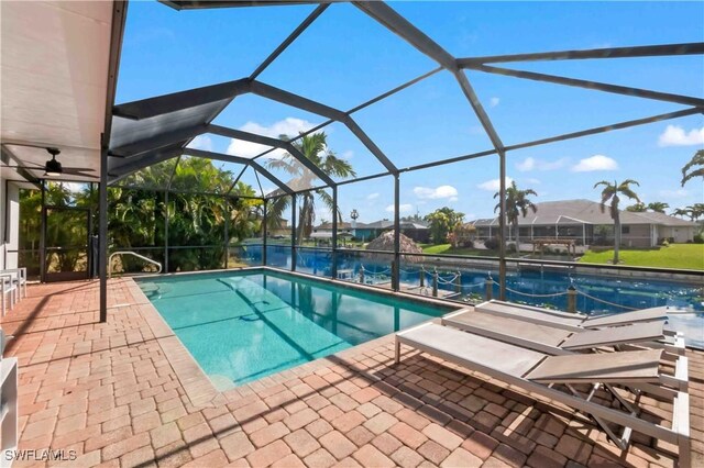 106 SE 5th St, Cape Coral, FL 33990 - swimming pool with a patio and glass enclosure