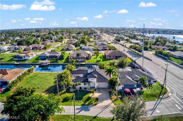 106 SE 5th St, Cape Coral, FL 33990 - aerial view of residential area featuring a nearby body of water