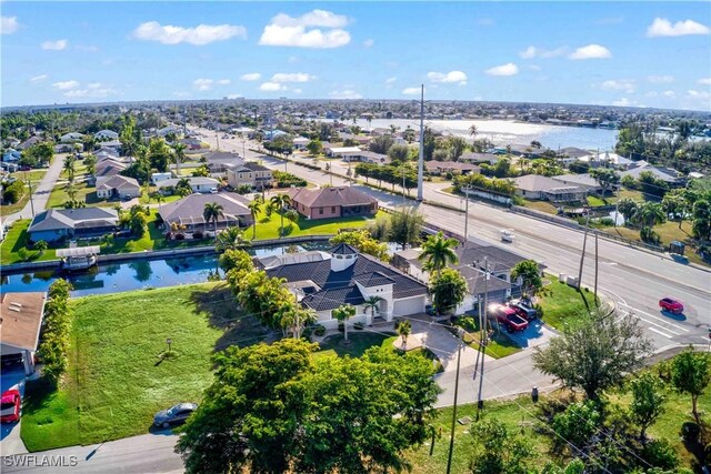 106 SE 5th St, Cape Coral, FL 33990 - aerial view of residential area with a nearby body of water