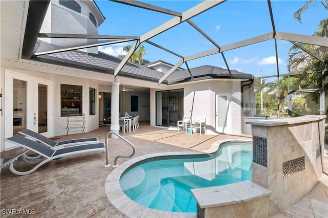 106 SE 5th St, Cape Coral, FL 33990 - swimming pool featuring a patio area, french doors, a ceiling fan, and a lanai
