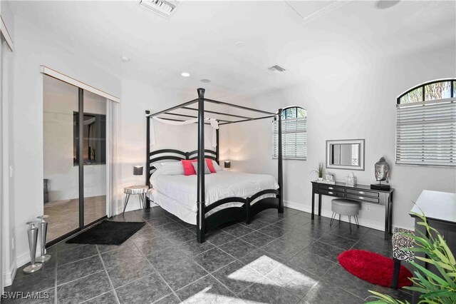 106 SE 5th St, Cape Coral, FL 33990 - bedroom featuring multiple windows, baseboards, and recessed lighting