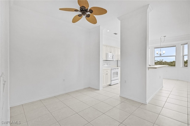 interior space featuring ceiling fan with notable chandelier and crown molding