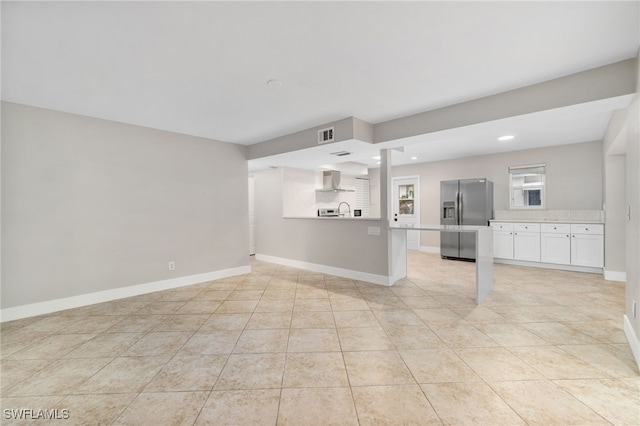 interior space featuring light tile patterned floors