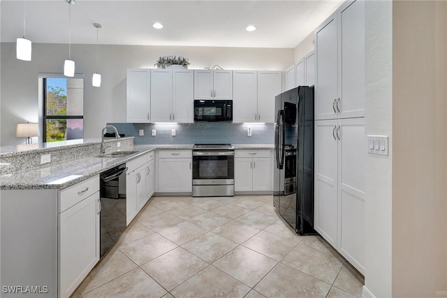 kitchen with light stone counters, tasteful backsplash, decorative light fixtures, black appliances, and white cabinets