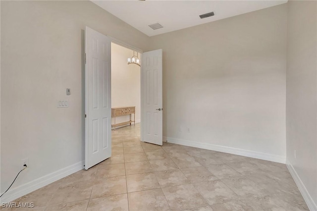 view of tiled spare room