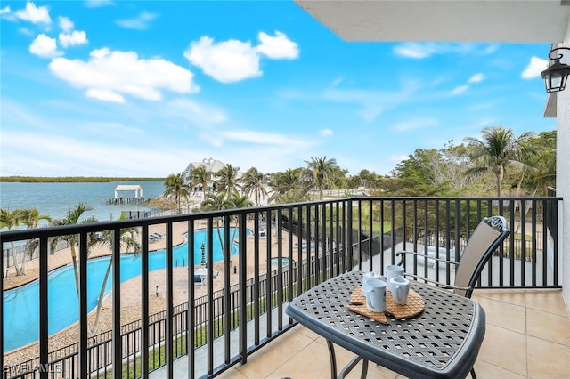 balcony featuring a water view