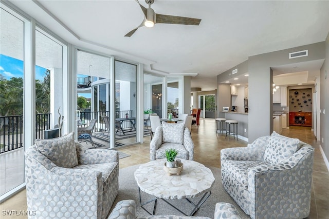 living room featuring ceiling fan