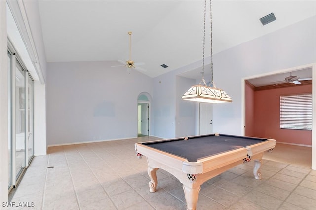 game room with lofted ceiling, light tile patterned floors, ceiling fan, and billiards