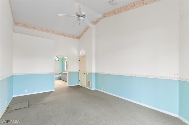 carpeted empty room with ceiling fan