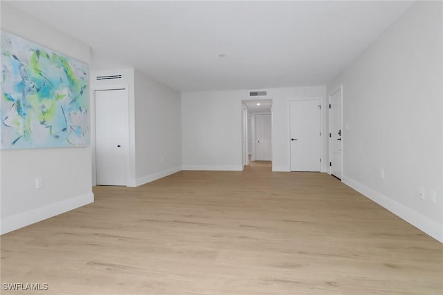 empty room with light wood-type flooring