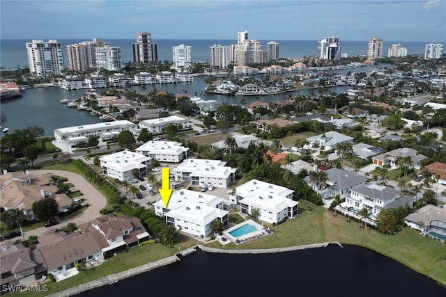 aerial view with a water view and a city view