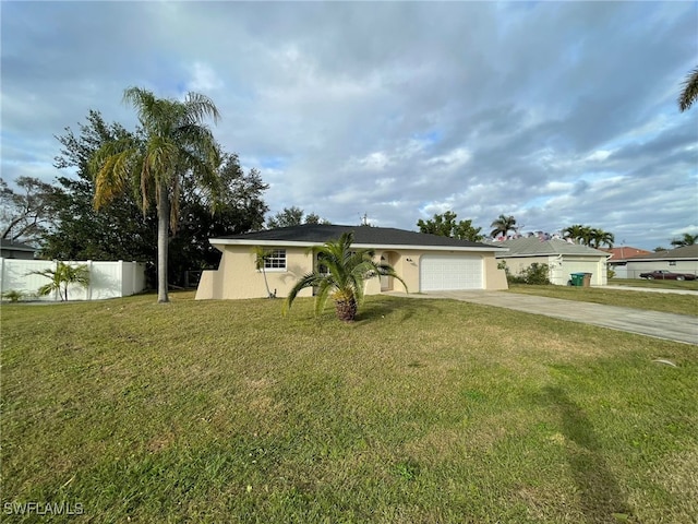 ranch-style home with a garage and a front yard