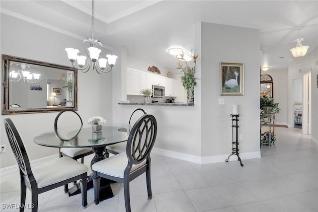 dining area featuring crown molding and light tile patterned floors