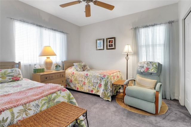 bedroom featuring ceiling fan and carpet flooring