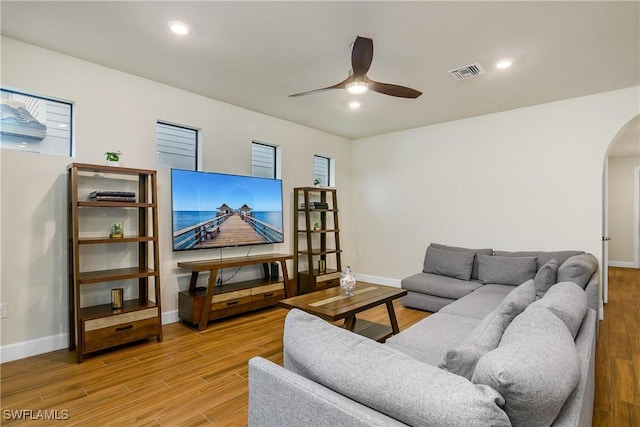 living room featuring ceiling fan