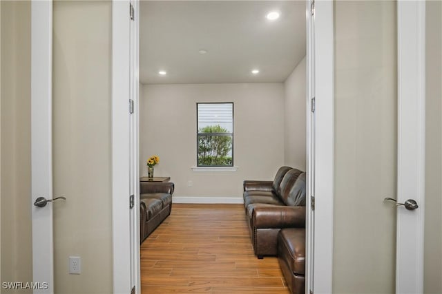 living area featuring light hardwood / wood-style floors