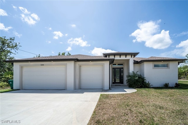 5435 Montego Ln, Port Charlotte, FL 33981 - prairie-style home featuring stucco siding, a garage, driveway, and a front yard