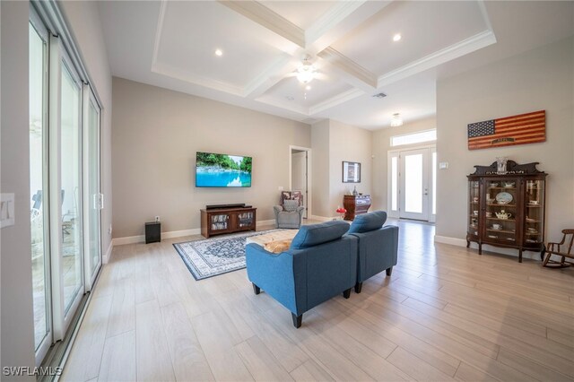5435 Montego Ln, Port Charlotte, FL 33981 - living area featuring beamed ceiling, coffered ceiling, light wood-style flooring, ceiling fan, and baseboards