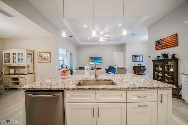 5435 Montego Ln, Port Charlotte, FL 33981 - kitchen featuring dishwasher, a sink, open floor plan, light wood-style floors, and coffered ceiling