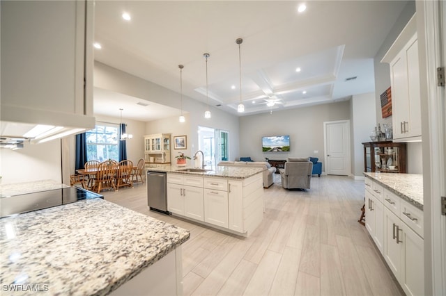 5435 Montego Ln, Port Charlotte, FL 33981 - kitchen with a sink, stainless steel dishwasher, coffered ceiling, recessed lighting, and white cabinetry