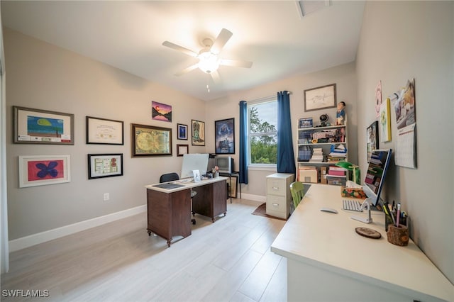 5435 Montego Ln, Port Charlotte, FL 33981 - office area with ceiling fan, light wood finished floors, and baseboards